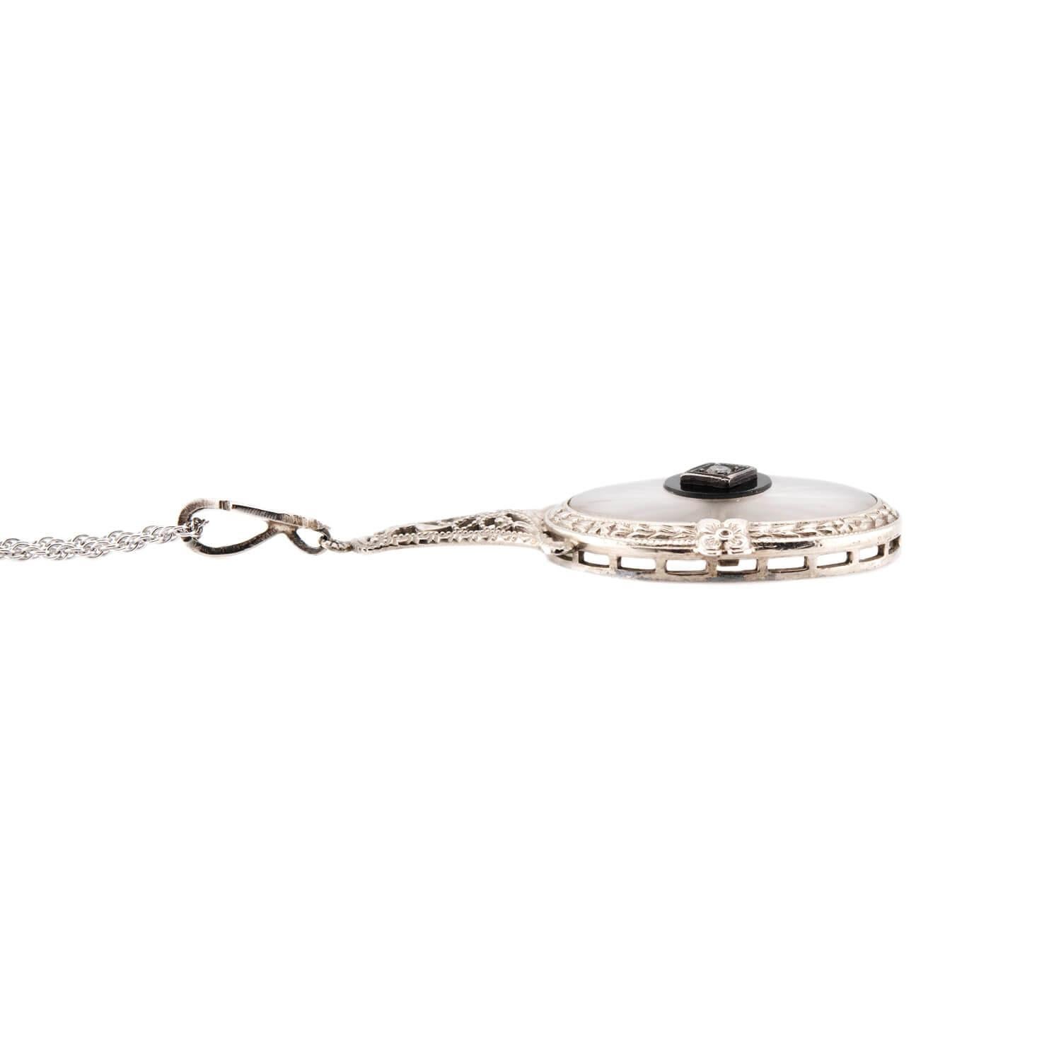 Oval Cut Art Deco 14k Rock Quartz Crystal, Onyx, and Diamond Pendant Necklace For Sale