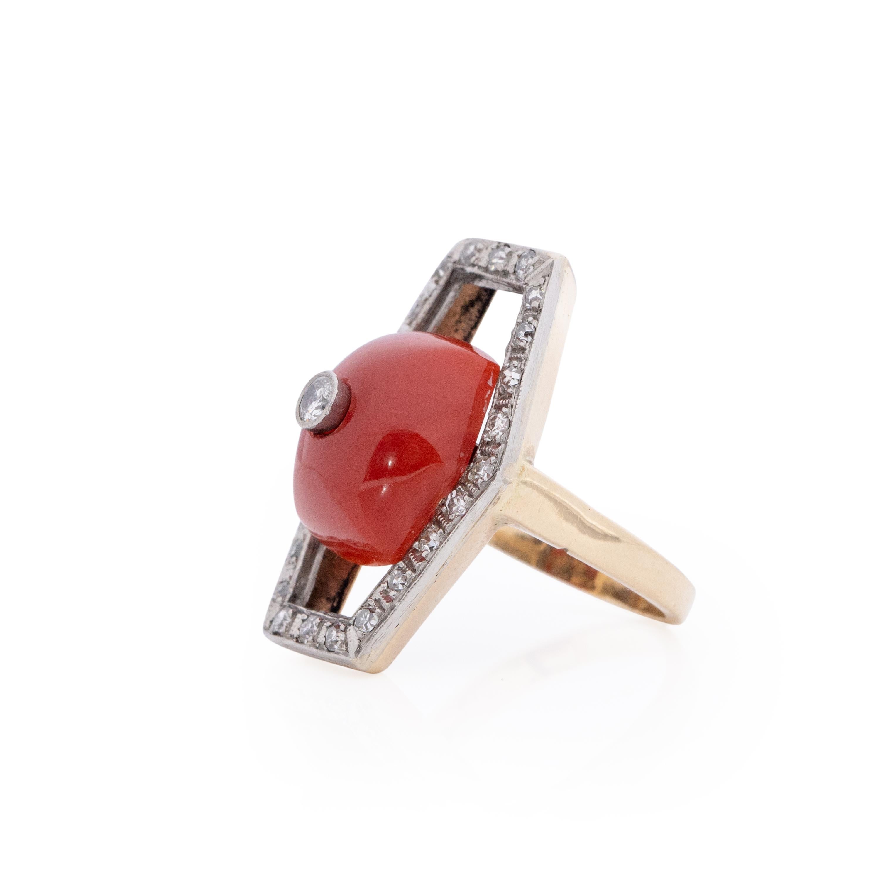 This funky little ring is a fun piece of art. From its 14K white and yellow two tone look, to the coffin shaped halo around the beautiful precious gem  Carnelian cabochon with a bezel set diamond in the center. This ring is one of a kind and a true