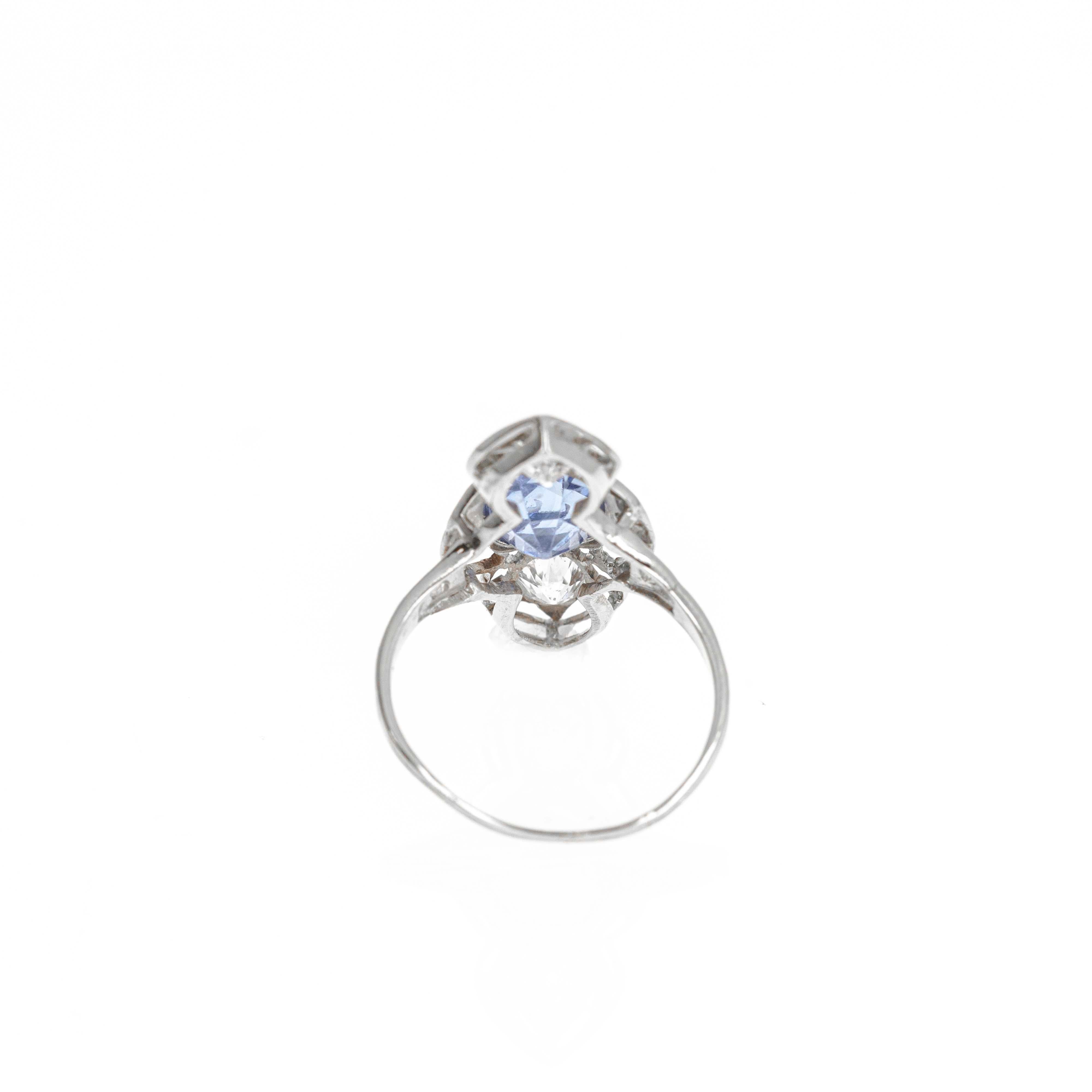 Era: Art Deco Estate
Composition: 14K White Gold
Primary Stone: One Oval Natural Sapphire
Carat Weight: Approximately 2.20 Carats
Accent Stone: Eight Old European Cut and Single Cut Diamonds
Carat Weight: Approximately 0.70 Carats
Color/Clarity: G-H