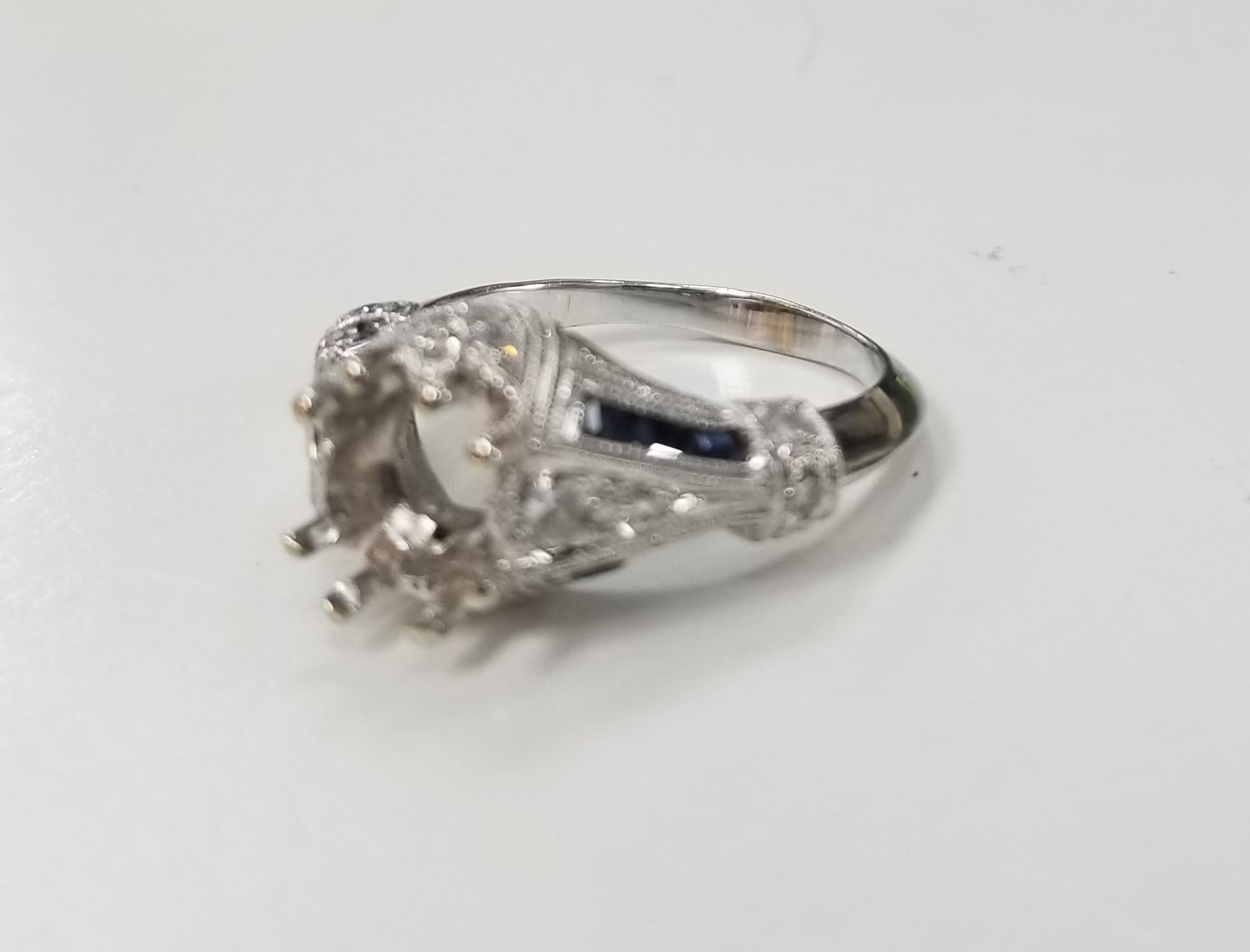 Art Deco inspired 14k white gold with diamonds-sapphires, containing  diamonds-sapphires weighing diamonds round .40pts. and sapphires square cut .60pts.  the ring is a size 6.5 and can be sized to fit for free. the ring can take 7.5mm to 8mm stone.
