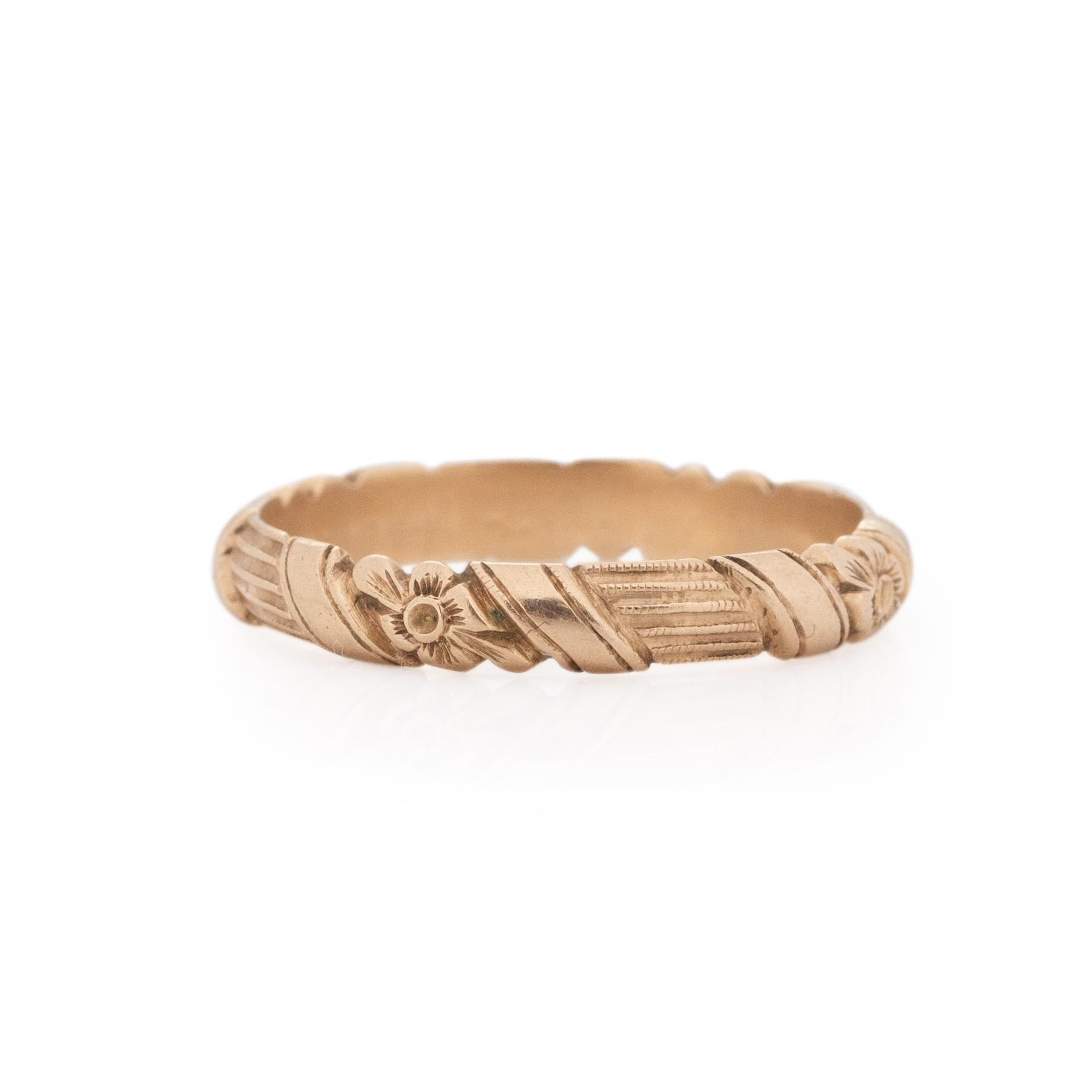 Here we have a beautiful Art deco classic. Crafted in 14K Yellow Gold this band is versatile and timeless, the basic pattern has beautiful floral details. The carvings are clean and have passed the test of time. This band would look great paired