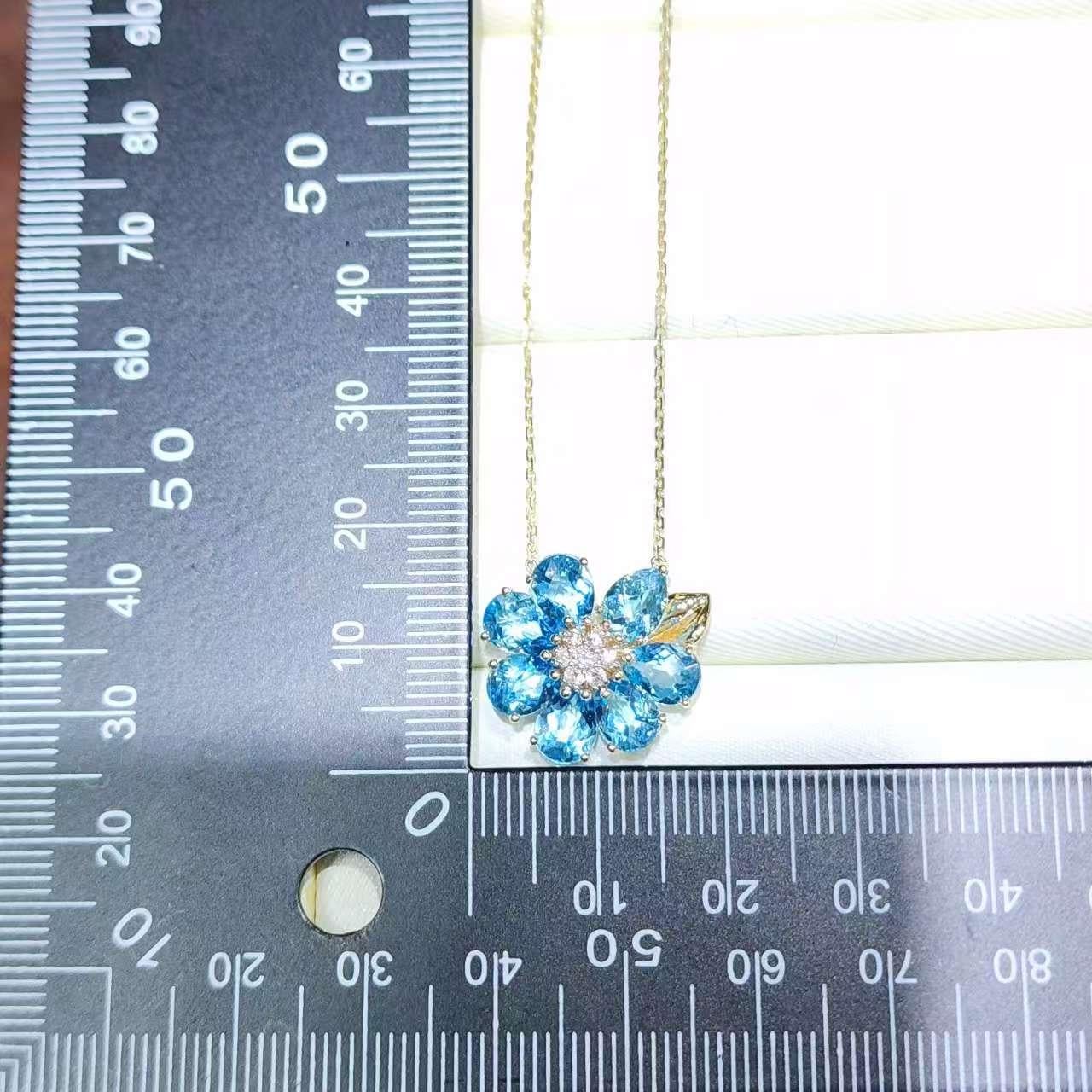 Pendentif Art Déco en or jaune 14K avec fleur de topaze bleue et diamants en vente 3