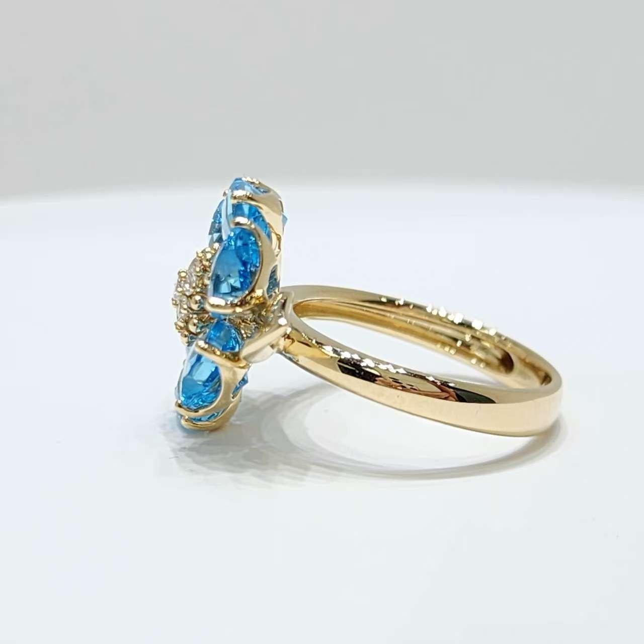 Bague Art déco en or jaune 14K avec fleur de topaze bleue et diamants en vente 1