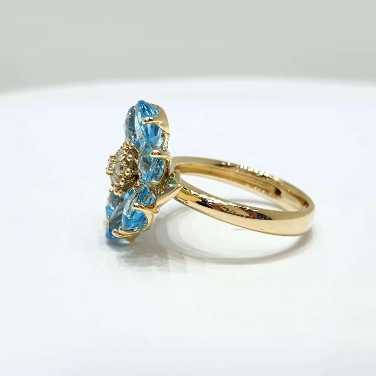 Bague Art déco en or jaune 14K avec fleur de topaze bleue et diamants en vente 1