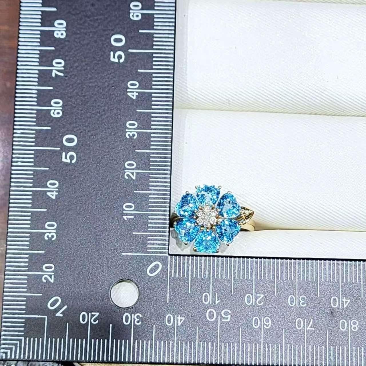 Bague Art déco en or jaune 14K avec fleur de topaze bleue et diamants en vente 2