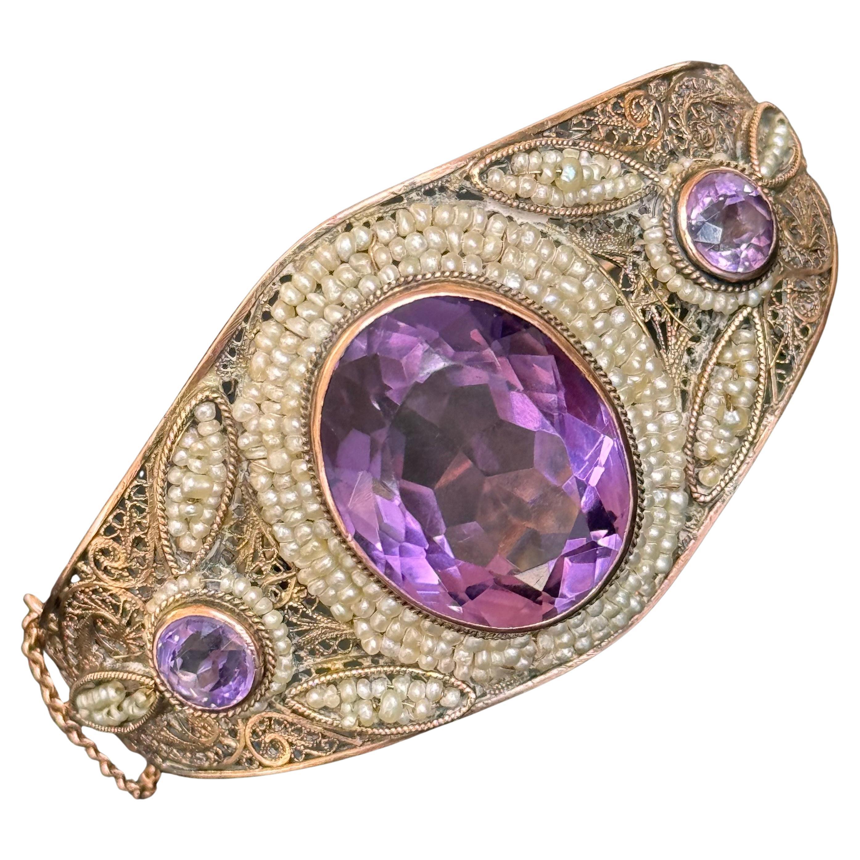 Art Deco 14kt Gold Seed Pearl Hinged Bangle Bracelet with Amethyst For Sale