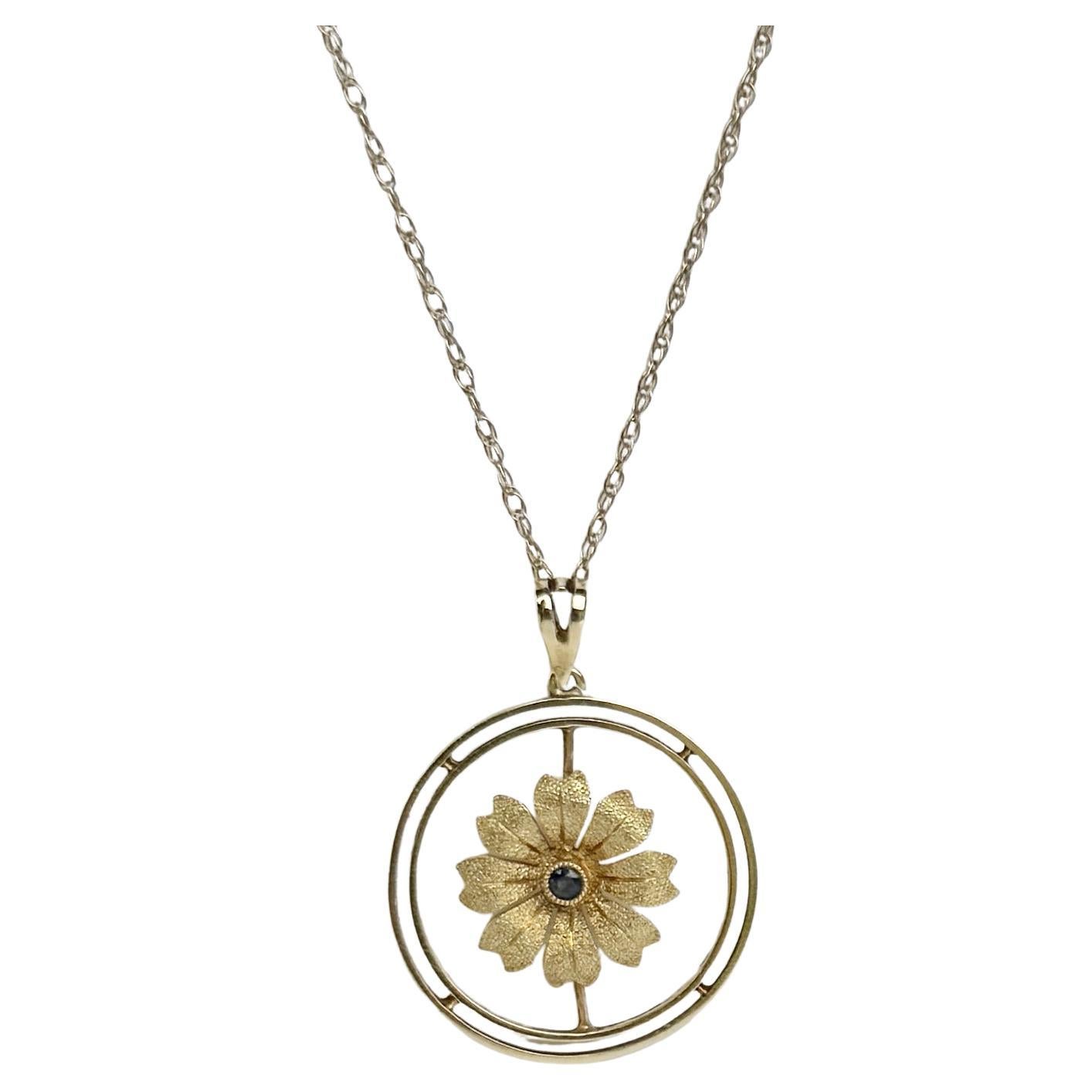 Ciondolo Art Deco in oro 15 carati e zaffiri su una catena in oro 9 carati