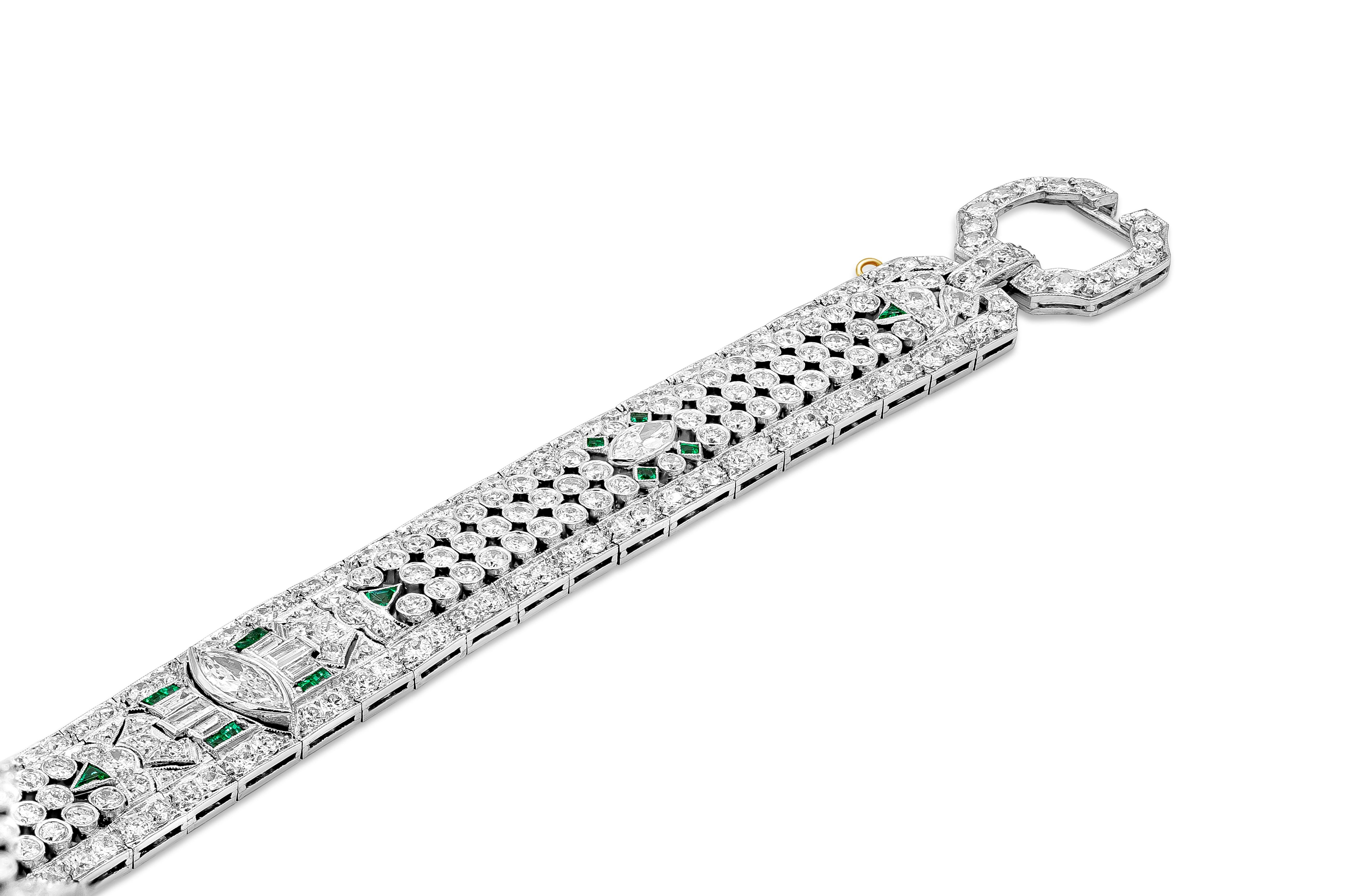 This striking bracelet features 15.50 carats of different cut diamonds in an elegant and intricate design. A full cut marquise diamond set at the center of the bracelet. Green Emeralds accent the bracelet as well. Made in platinum. A very well made