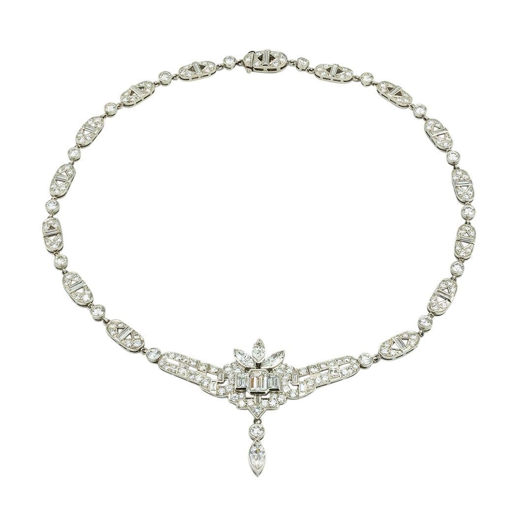Art Deco diamond and platinum necklace circa 1935. *

ABOUT THIS ITEM:  #N-DJ525E. Scroll down for detailed specifications.  The importance of this Art Deco diamond necklace cannot be overstated.  Several larger diamonds, including an emerald-cut