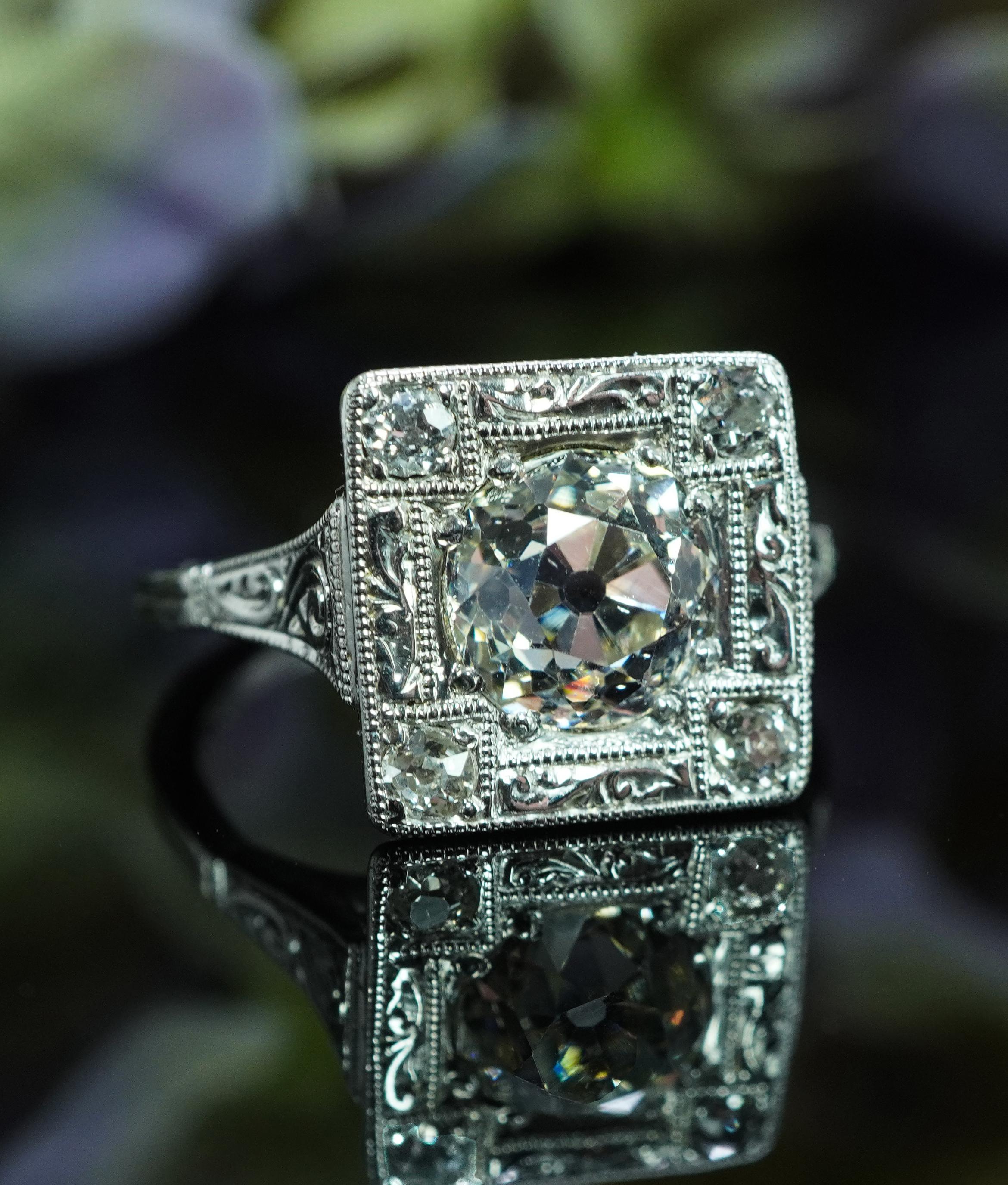  ART DECO 1.57ct center Old European Diamond Platinum Engagement Ring Appraisal 

This is an exquisite piece of original Art Deco platinum jewelry circa 1920s. The glorious center Old European cut diamond looks fantastic set presiding on top of a