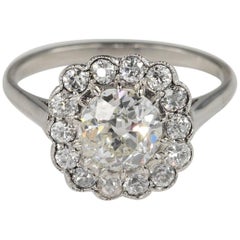 Antique Art Deco 1.60 Carat Diamond Cluster Engagement Platinum Ring