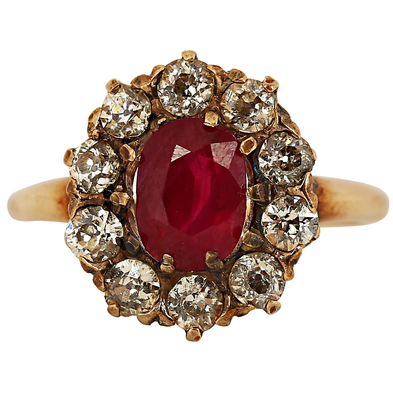 Art Deco 1.60 Carat Ruby and Diamond Halo Ring For Sale