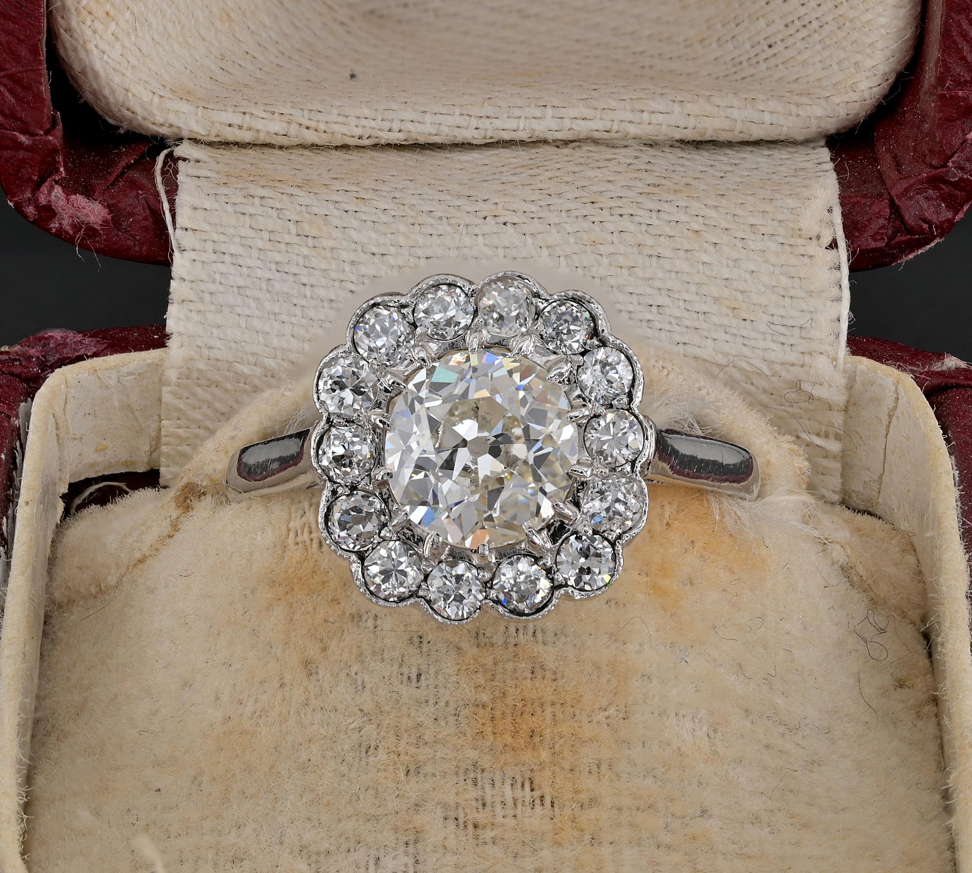 This beautiful late Art Deco is 1935 ca
Hand crafted of solid Platinum, marked
an old Halo ring with timeless presence and appeal
Principle Diamond is a bright white old European cut of 1.15 Ct which spreads as much as 1.25 Ct if measured with a