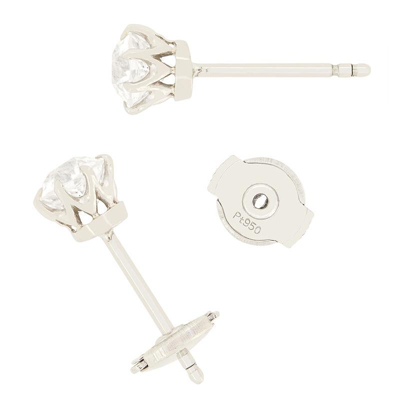 These classic stud earrings from the Art Deco era exude timeless sophistication. Each earring features a stunning 0.80 carat old cut diamond securely claw set in platinum. The pair range in colour from G to H and match in clarity at SI1.  The