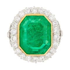 Art Deco 16.10 Carat Colombian Emerald and Transitional Cut Diamond Halo Ring