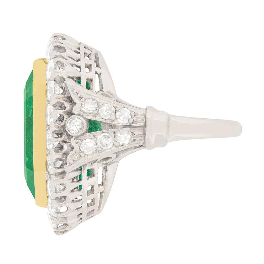 Emerald Cut Art Deco 16.10 Carat Colombian Emerald and Transitional Cut Diamond Halo Ring For Sale