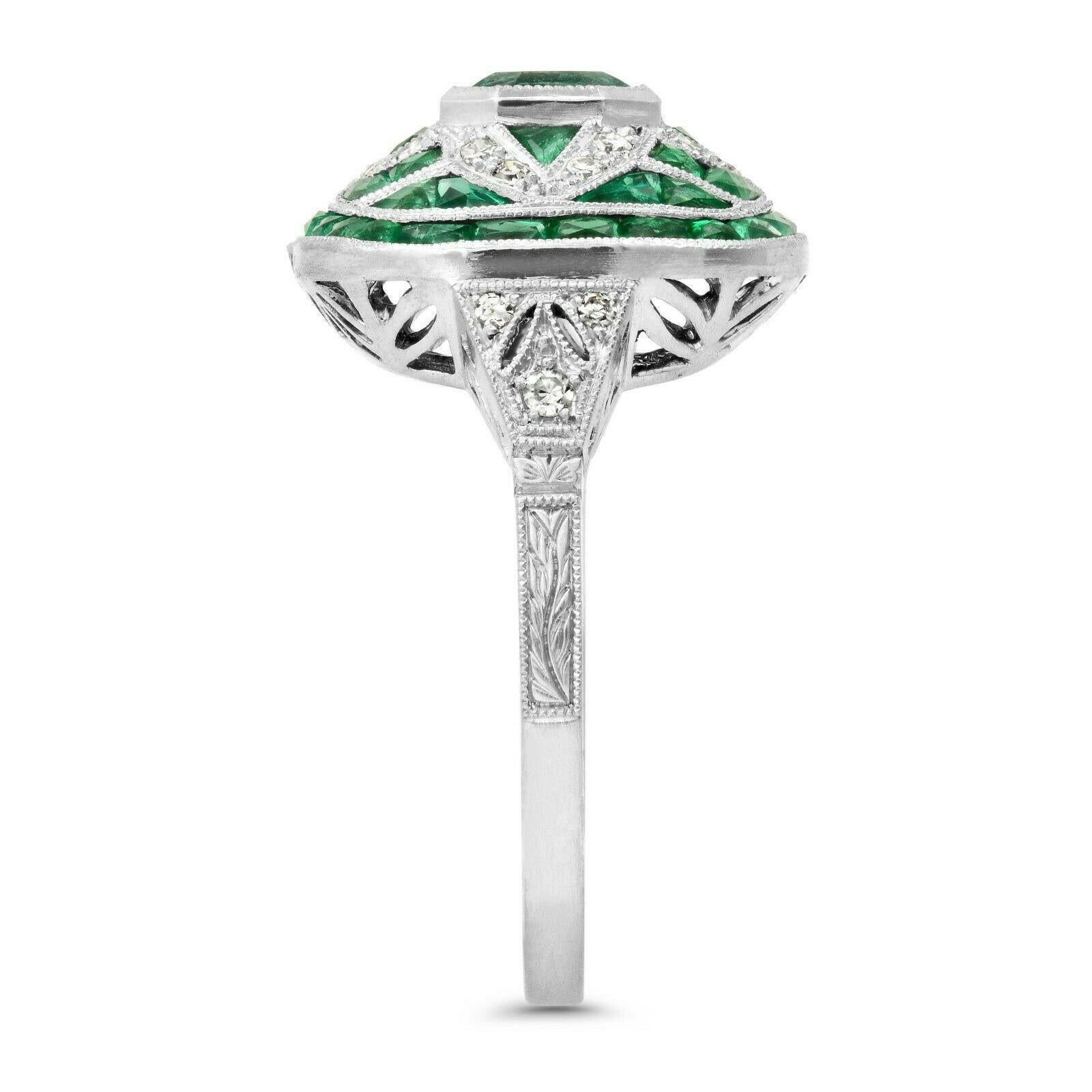 Emerald (1.64 total carat weight) and diamond (0.1 total carat weight) antique inspired cocktail ring in 900 platinum. The ring is designed and handmade locally in Los Angeles by Sage Designs L.A. using earth-mined and conflict free diamonds and