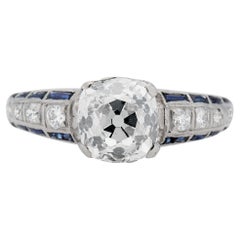 Anello di fidanzamento in platino Art Deco con diamante da 1,65 carati e zaffiro taglio baguette