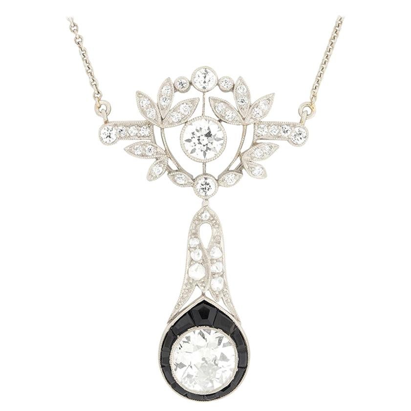 Art Deco 1.65 Carat Diamond and Onyx Drop Pendant Necklace, circa 1920s For Sale