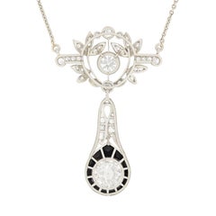 Art Deco 1.65 Carat Diamond and Onyx Drop Pendant Necklace, circa 1920s
