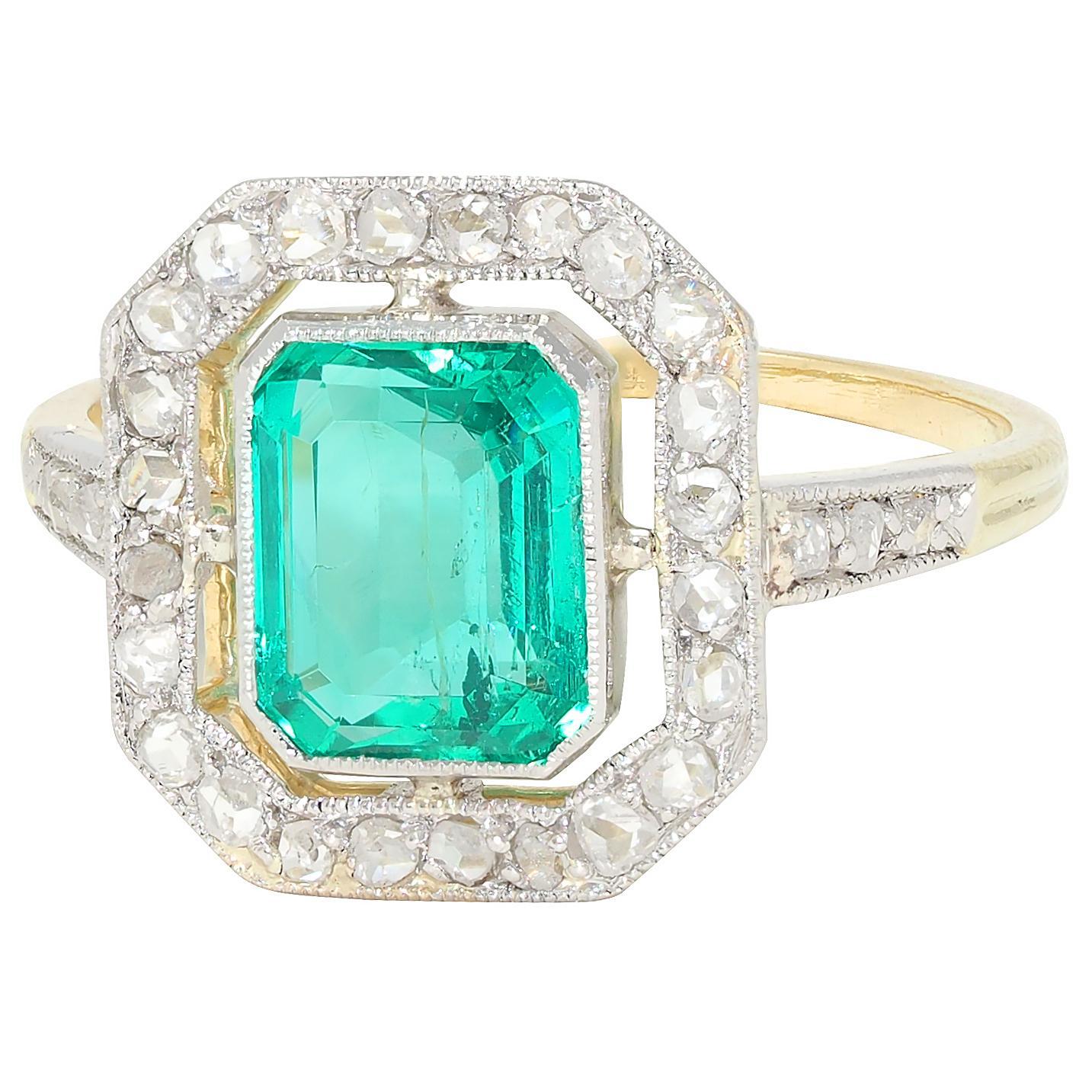 Femenino o masculino Art Deco 1.67 CTW Colombian Emerald Diamond Platinum 18K Gold Antique Halo Ring en venta