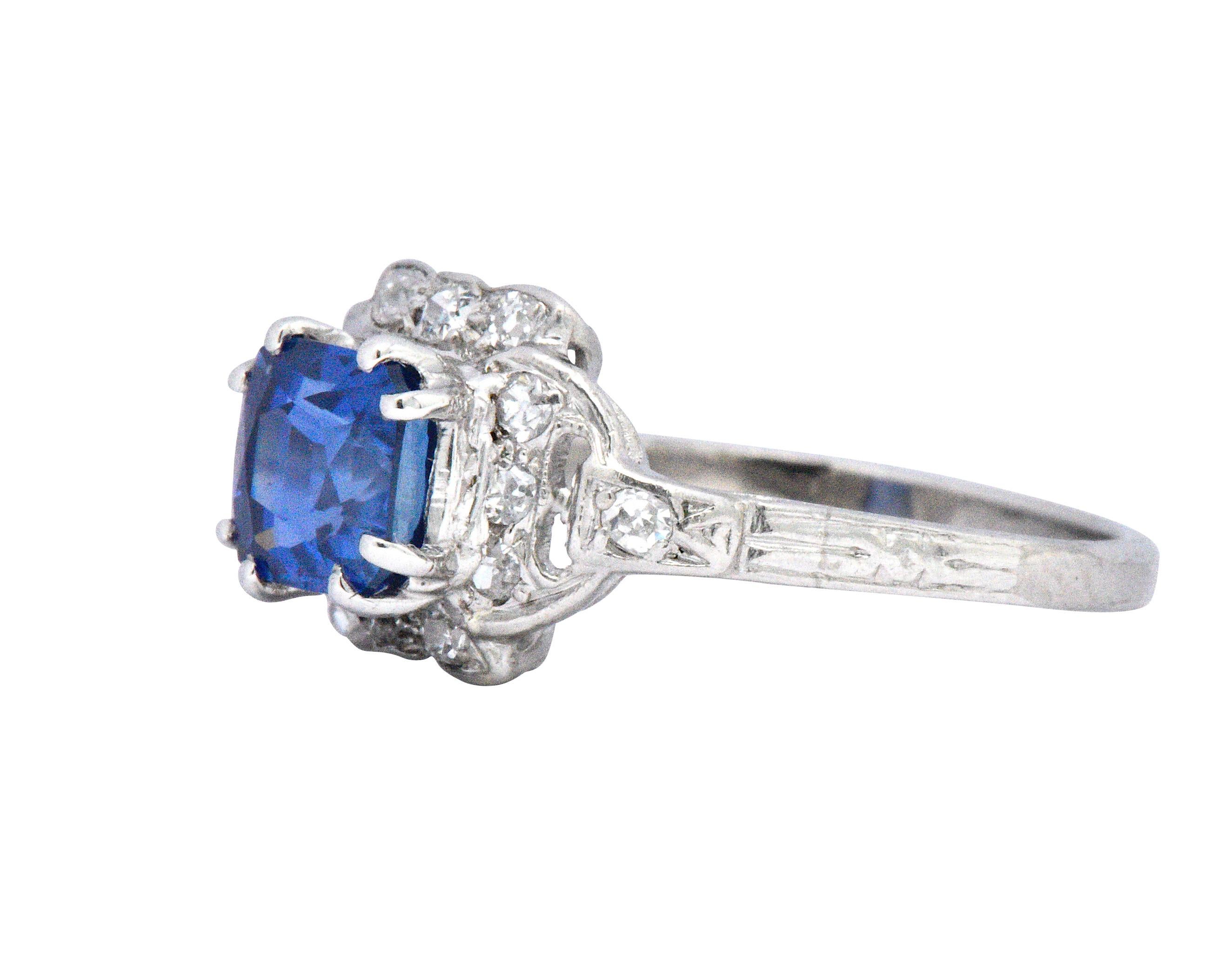 Centering a cushion cut sapphire weighing 1.47 carats

Single cut accent diamonds total carat weight 0.20, G/H color and VS to I clarity

Tested platinum mount 

Top measures 9.0 mm wide and sits 5.4 mm high

Ring Size: 5 1/4 & Sizable 

Total