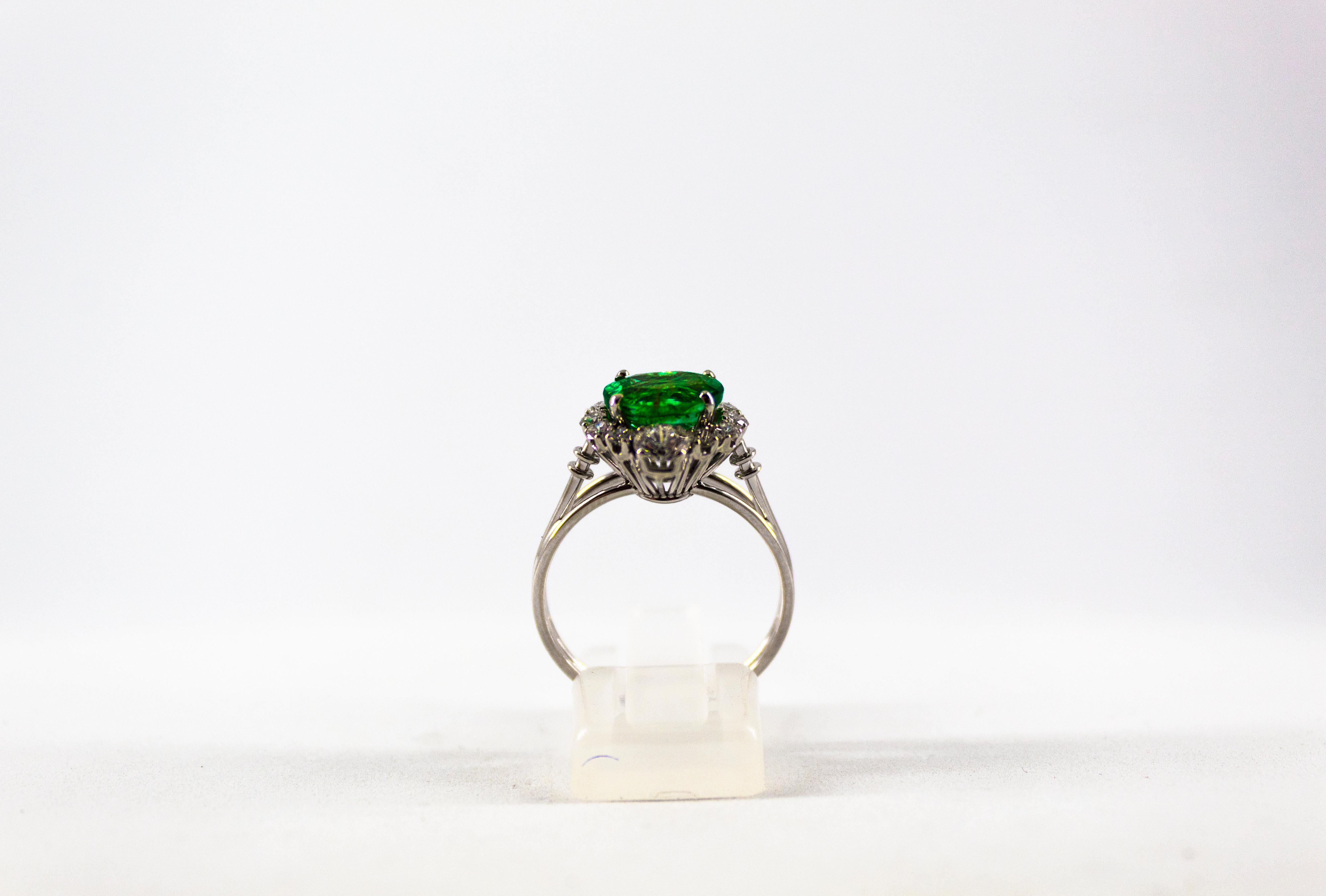 Women's or Men's Art Deco 1.68 Carat Emerald 1.25 Carat White Diamond White Cocktail Ring