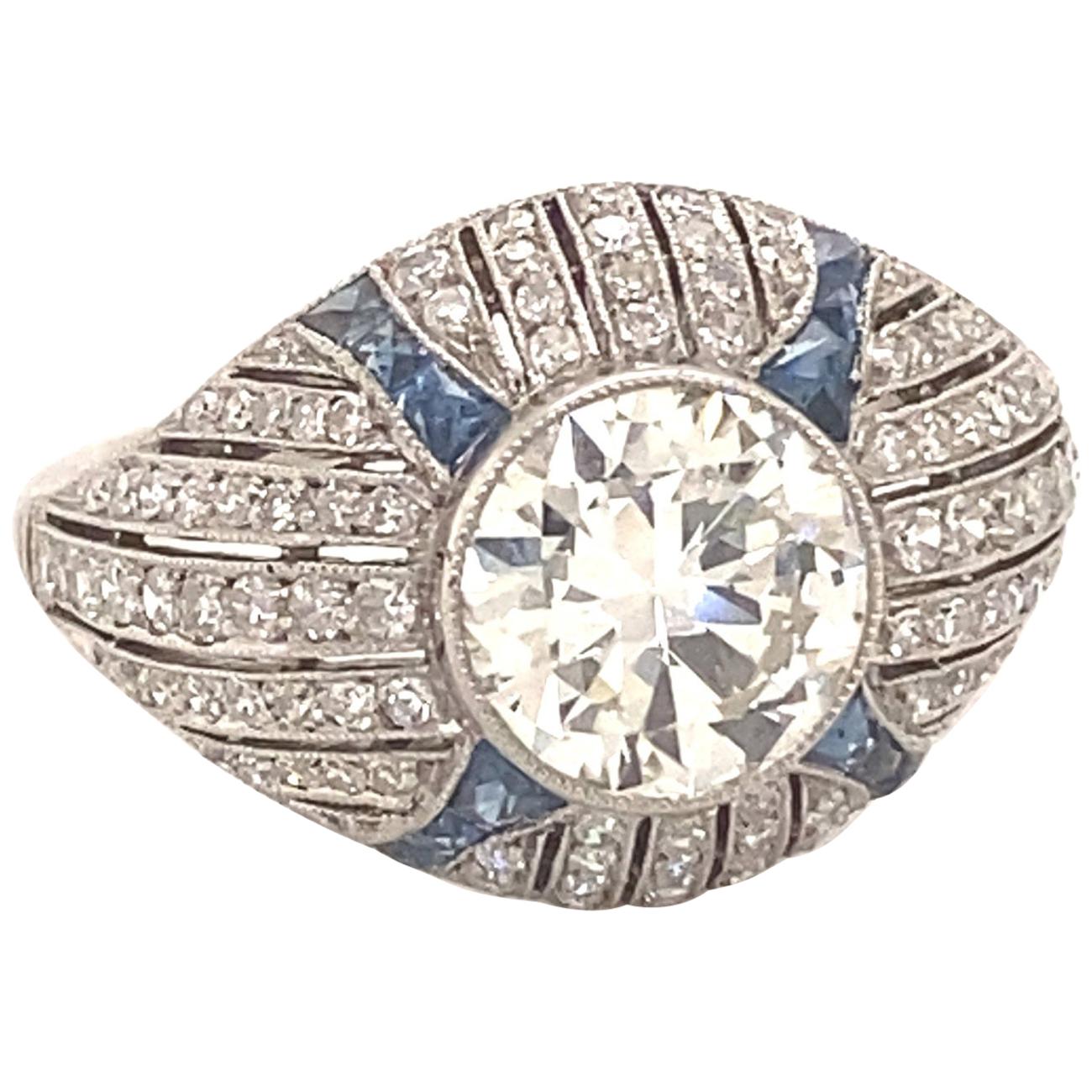 Art Deco Style 1.68 Center Diamond Platinum Sapphires Engagement Ring For Sale