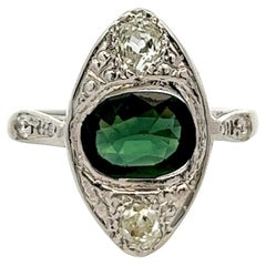 Anello da cena Art Deco con zaffiro verde e diamante in platino con navetta da 1,74 carati