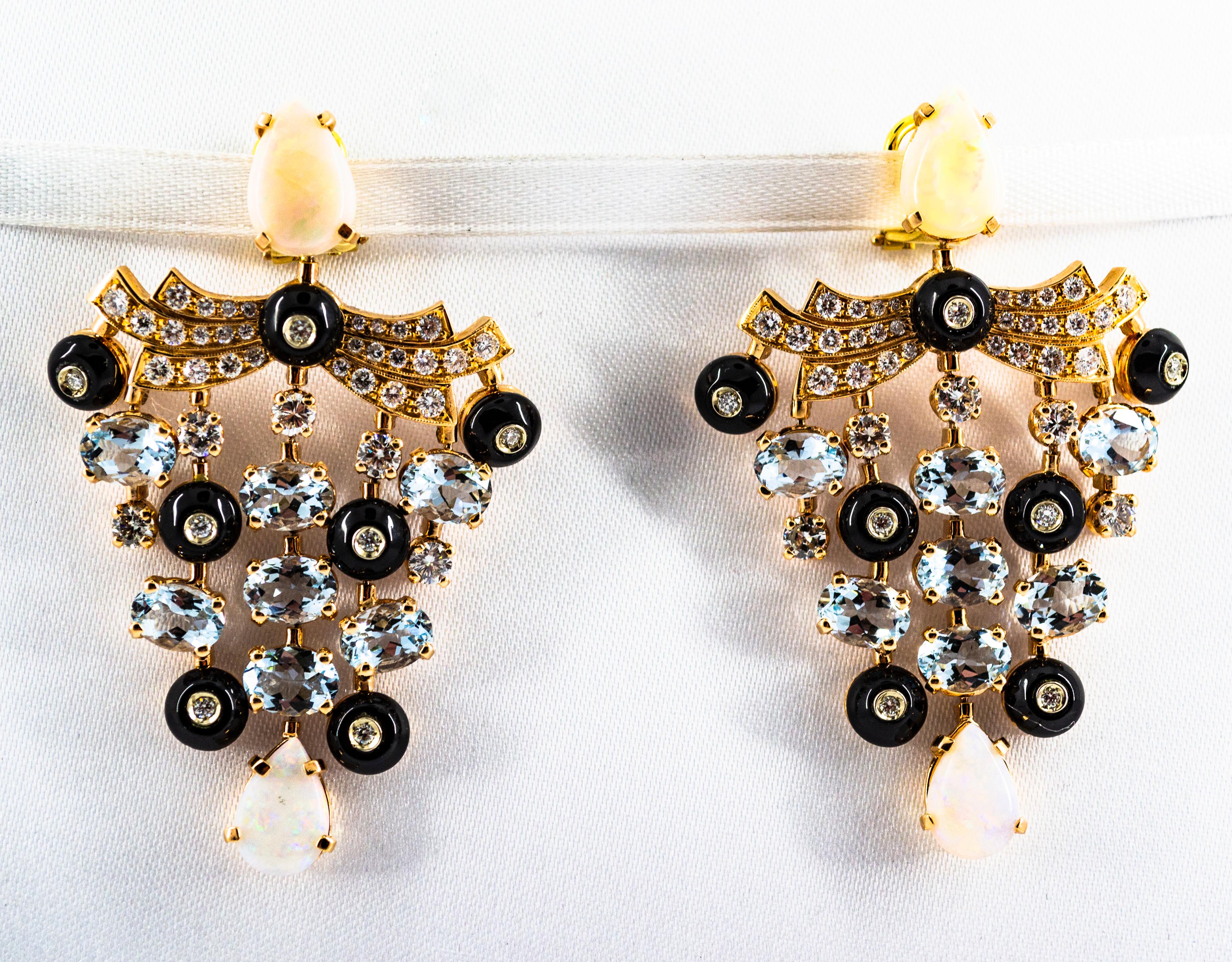 These Clip-On Earrings are made of 14K Yellow Gold.
These Earrings have 2.80 Carats of White Brilliant Cut Diamonds.
These Earrings have 9.80 Carats of Aquamarine.
These Earrings have 5.22 Carats of Opal.
These Earrings have also Onyx.

All our