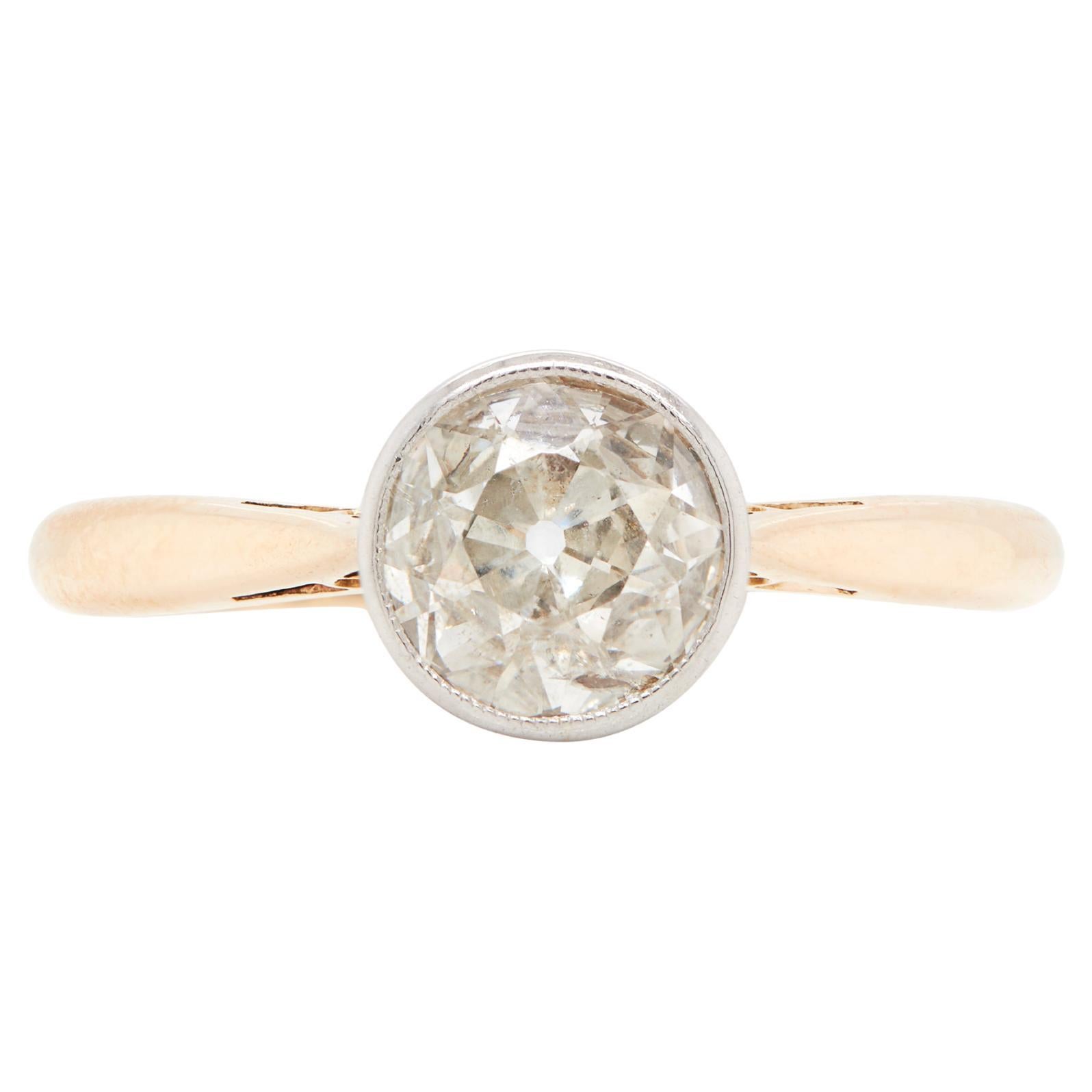 Art Deco 18 Carat Gold and Platinum Solitaire Diamond Ring in Rub-Over Setting For Sale