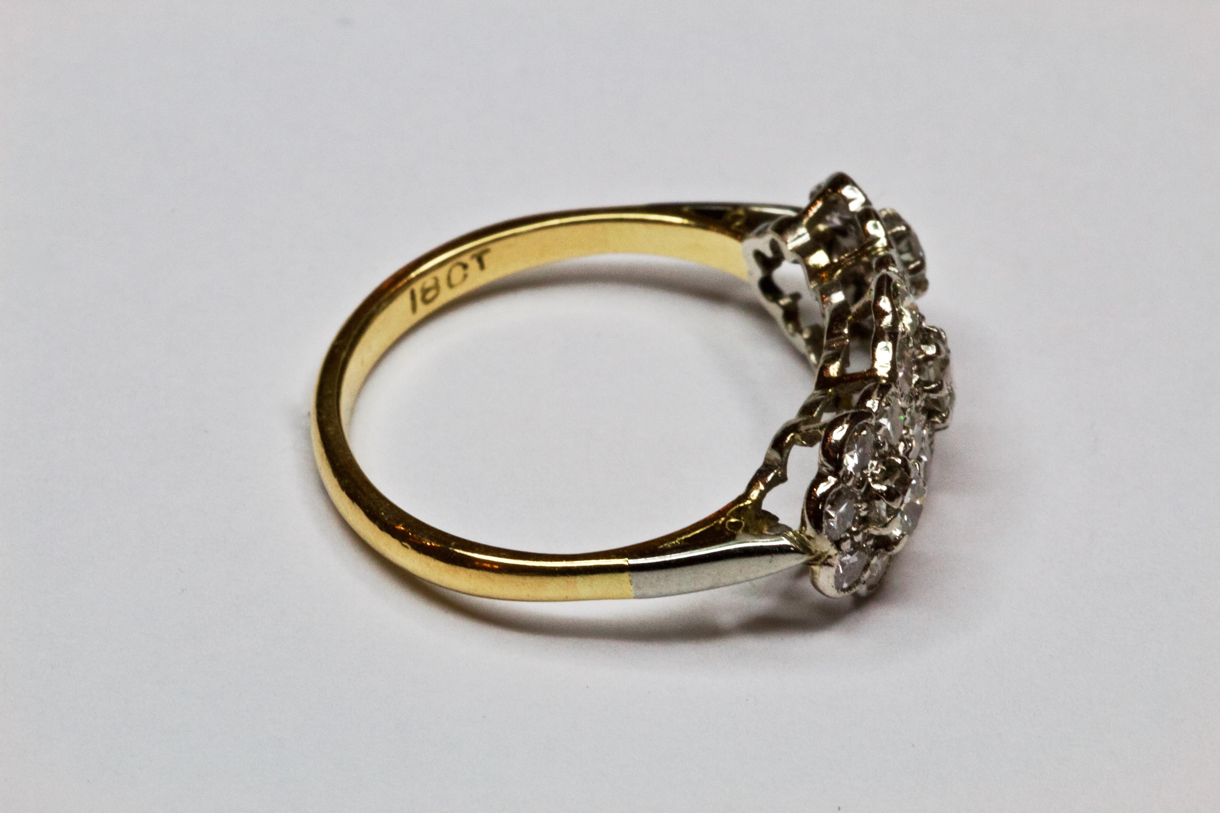 Old European Cut Art Deco 18 Carat Gold and Platinum Triple Cluster Diamond Ring For Sale