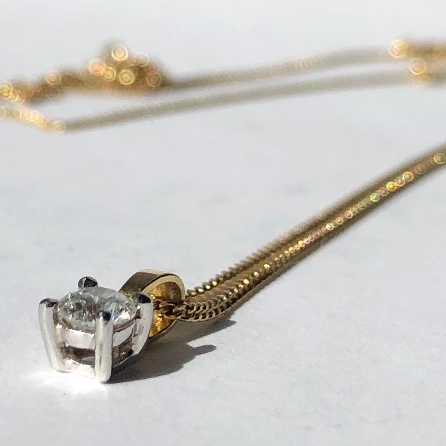 This sweet and delicate brilliant cut diamond pendant holds a stone measuring 35pts and is set in platinum. The rest of the pendant and the chain is modelled 

Chain Length: 45cm
Total Pendant Drop: 10mm 

Weight: 2.7g