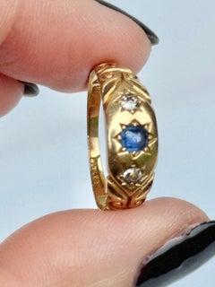 Art Deco 18 Carat Gold Sapphire and Diamond Three Stone Star Setting Ring