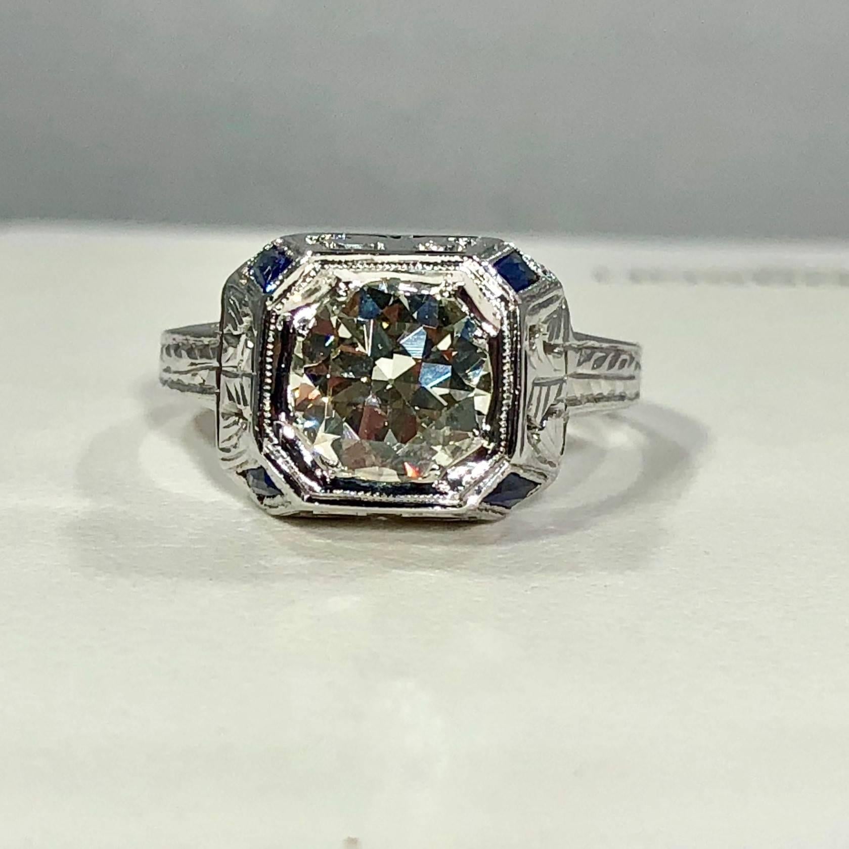 Women's Art Deco 18 Karat 1.40 Carat European Cut Diamond and Sapphire Engagement Ring