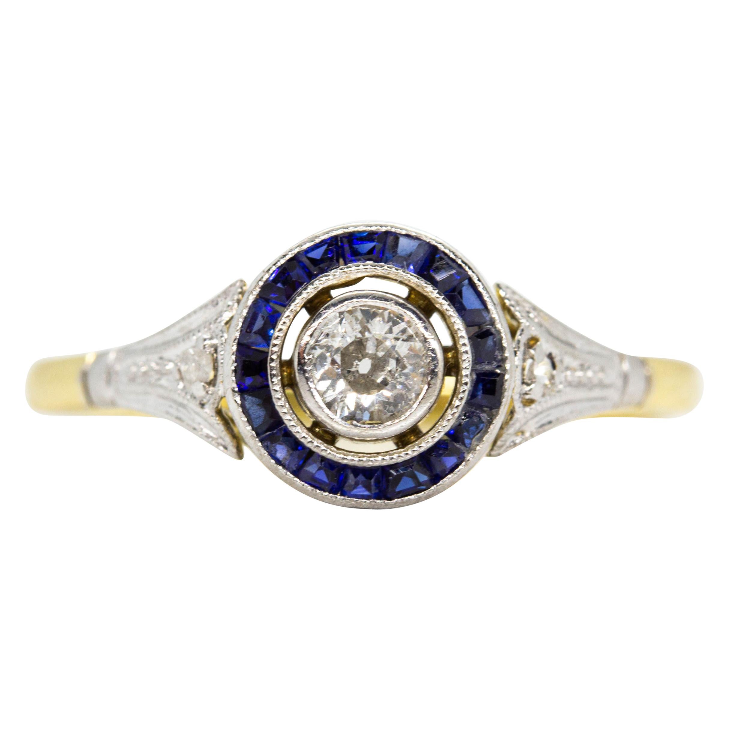 Art Deco 18 Karat Gold and Platinum Diamond and Sapphires Ring