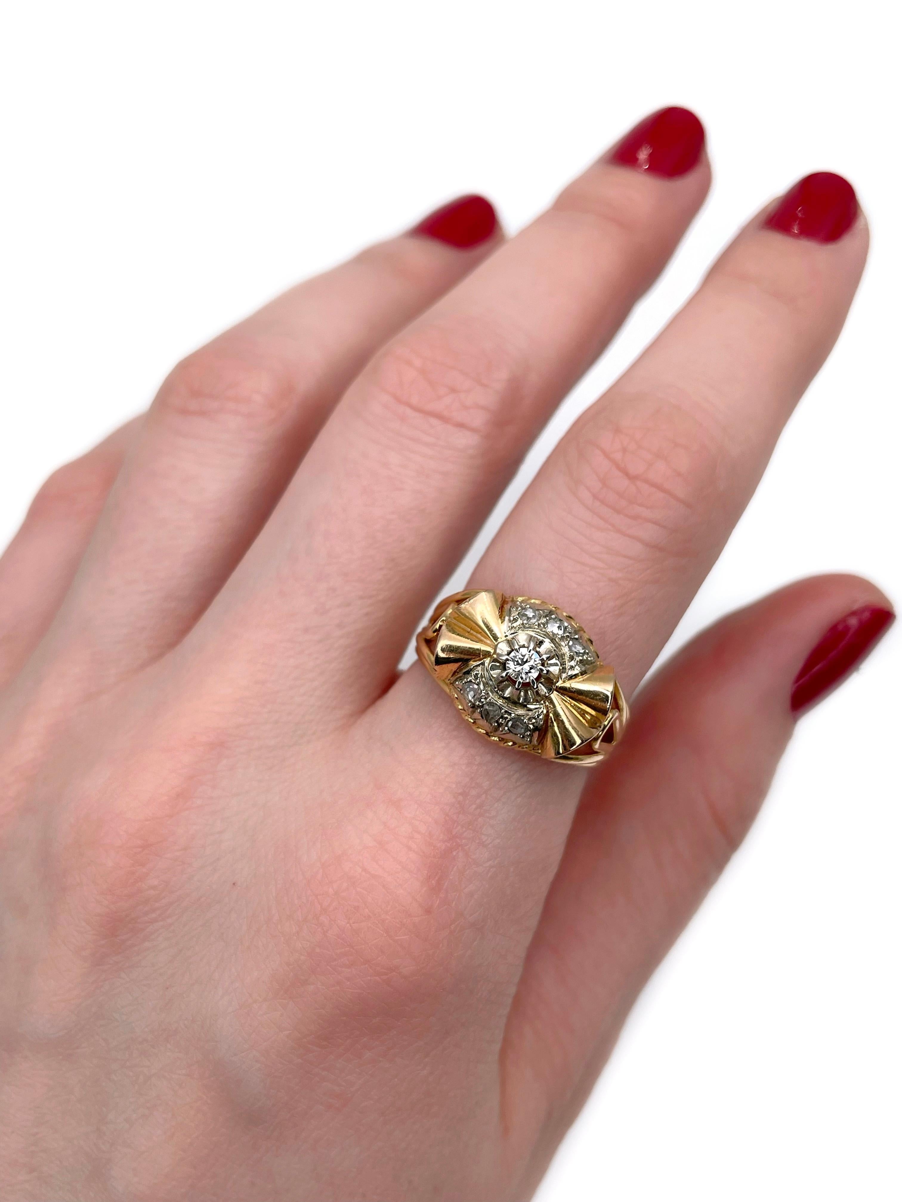 This is an Art Deco bow shape cocktail ring crafted in 18K yellow gold. Circa 1930. 

The piece features diamonds (TW 0.17ct):
- 1 diamond, round brilliant cut, 0.08ct, RW-W, SI
- 6 diamonds, rose cut, TW 0.09ct, RW-W, SI-P1

Weight: 5.14g 
Size: