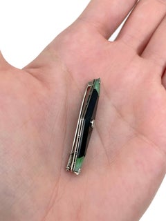 Broche Art déco en or 18 carats, diamant, calcédoine, jadéite de forme géométrique