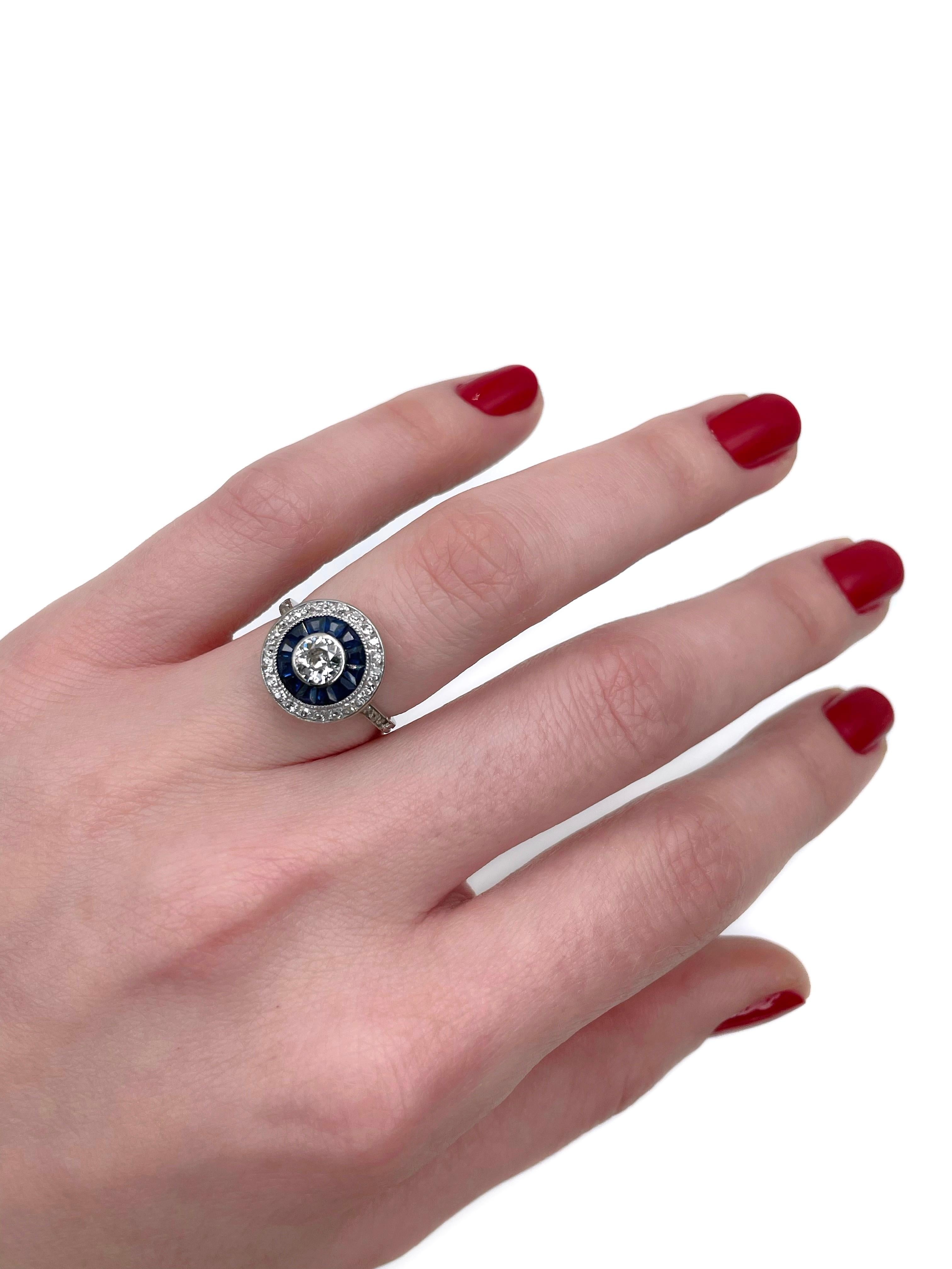 This is an Art Deco target cluster ring crafted in 18K gold. Circa 1930.

The piece features mixed cut diamonds and sapphires.

Weight: 3.24g
Size: 15.5 (US4.75)

IMPORTANT: please ask about the possibility to resize before purchase. This process