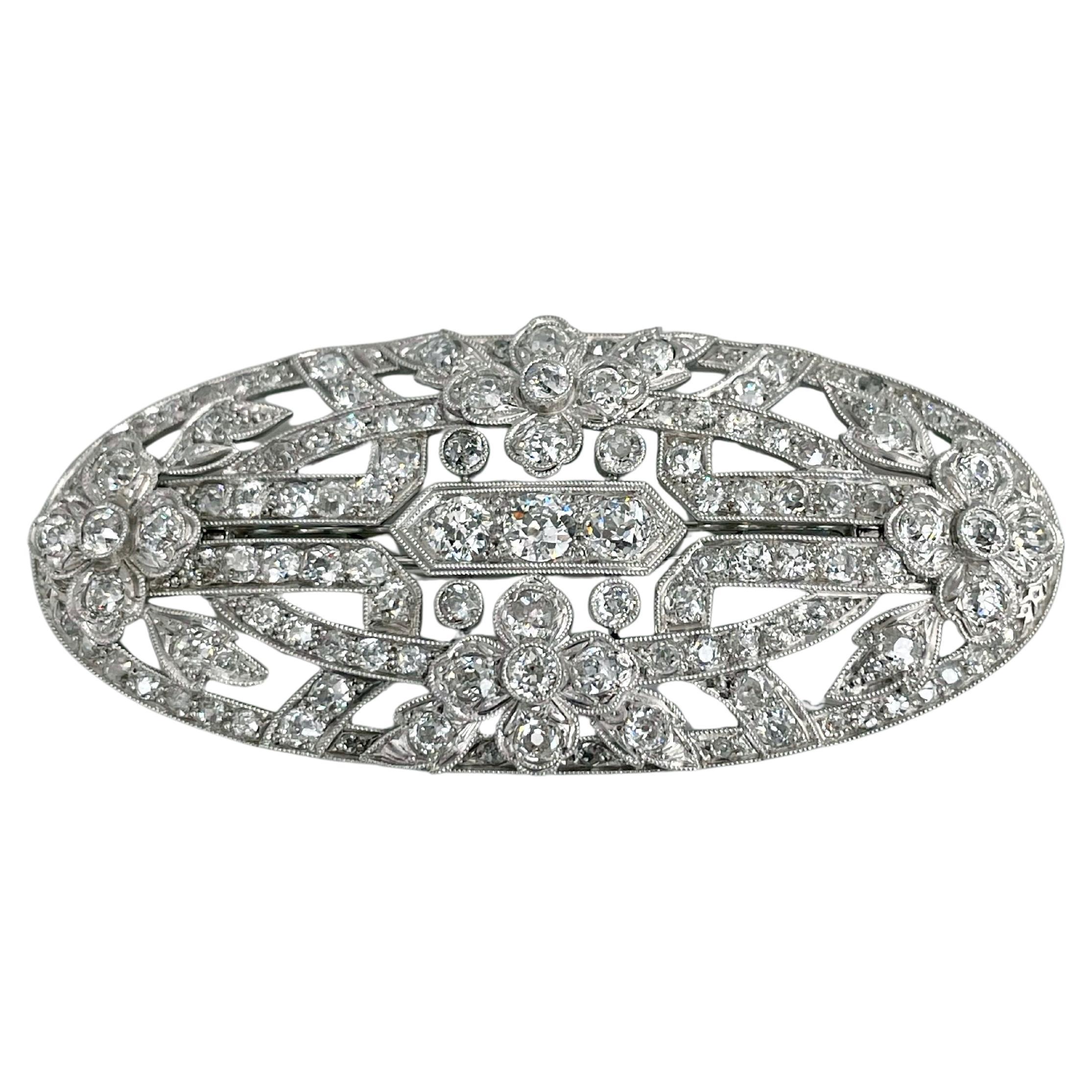 Ciondolo spilla floreale Art Deco in oro 18 carati con diamante taglio vecchio ovale traforato
