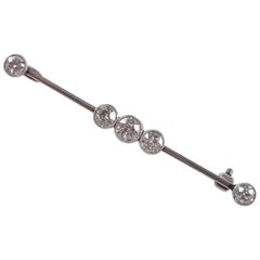 Art Deco 18 Karat White Gold 1.0 Carat 5-Stone Diamond Bar Brooch, circa 1925