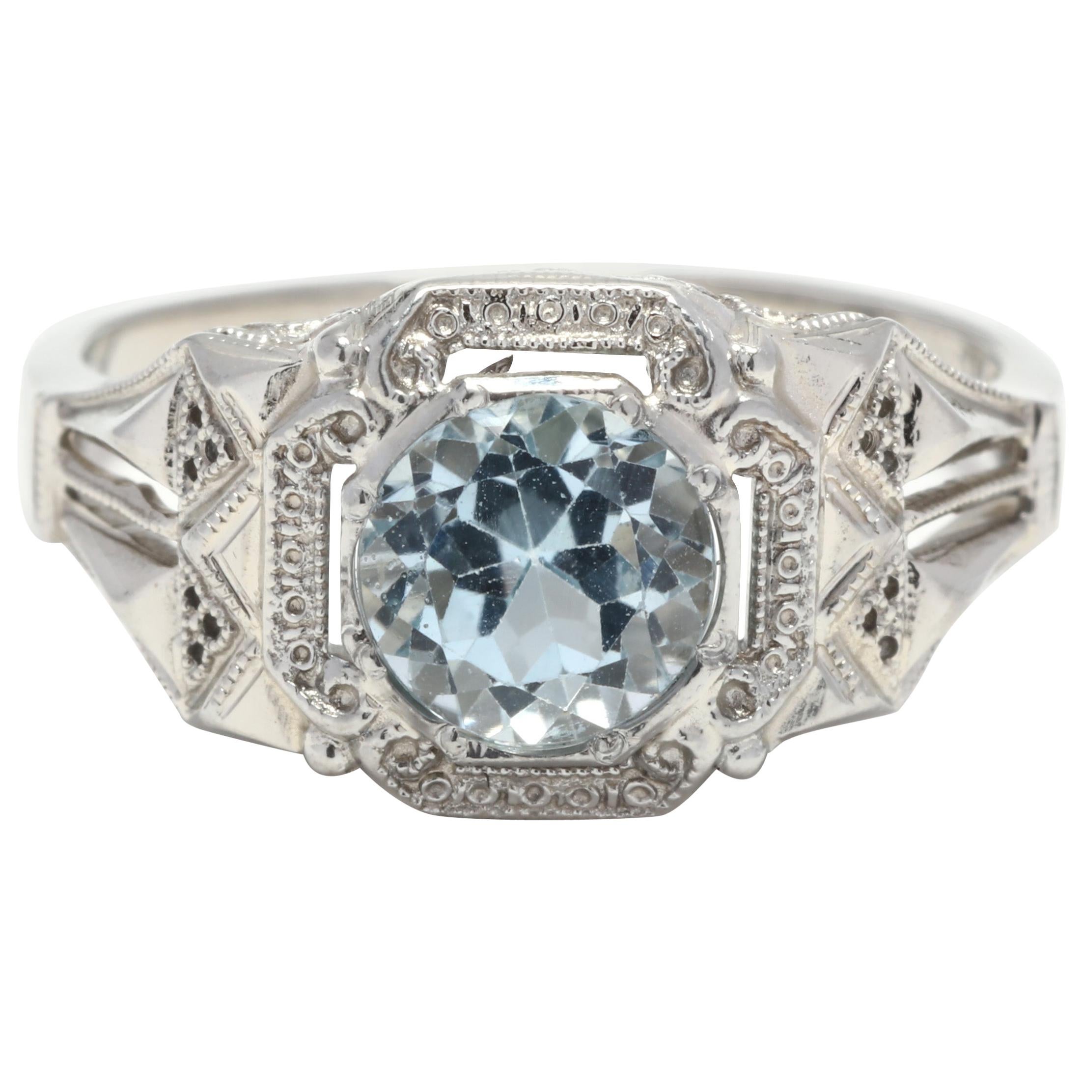Art Deco 18 Karat White Gold and Blue Topaz Engagement Ring