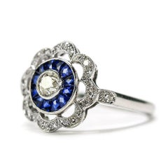 Art Deco 18 Karat White Gold Diamond and Blue Sapphire Daisy Target Ring