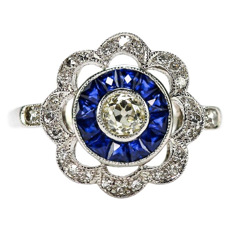 Art Deco 18 Karat White Gold Diamond and Blue Sapphire Daisy Target Ring