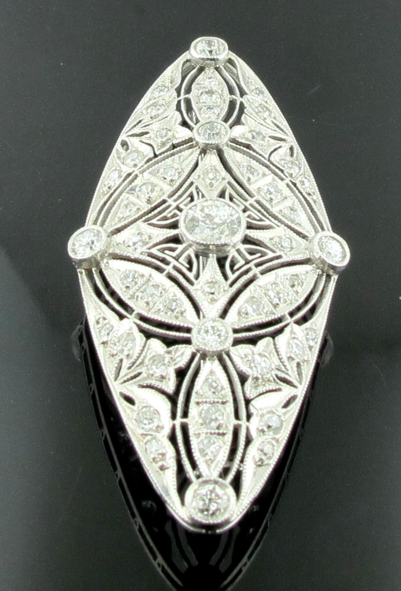 Art Deco 18 karat white gold diamond brooch with pendant capabilities.  Center diamond is 0.40 carats and the total diamond weight is 2.30 carats.