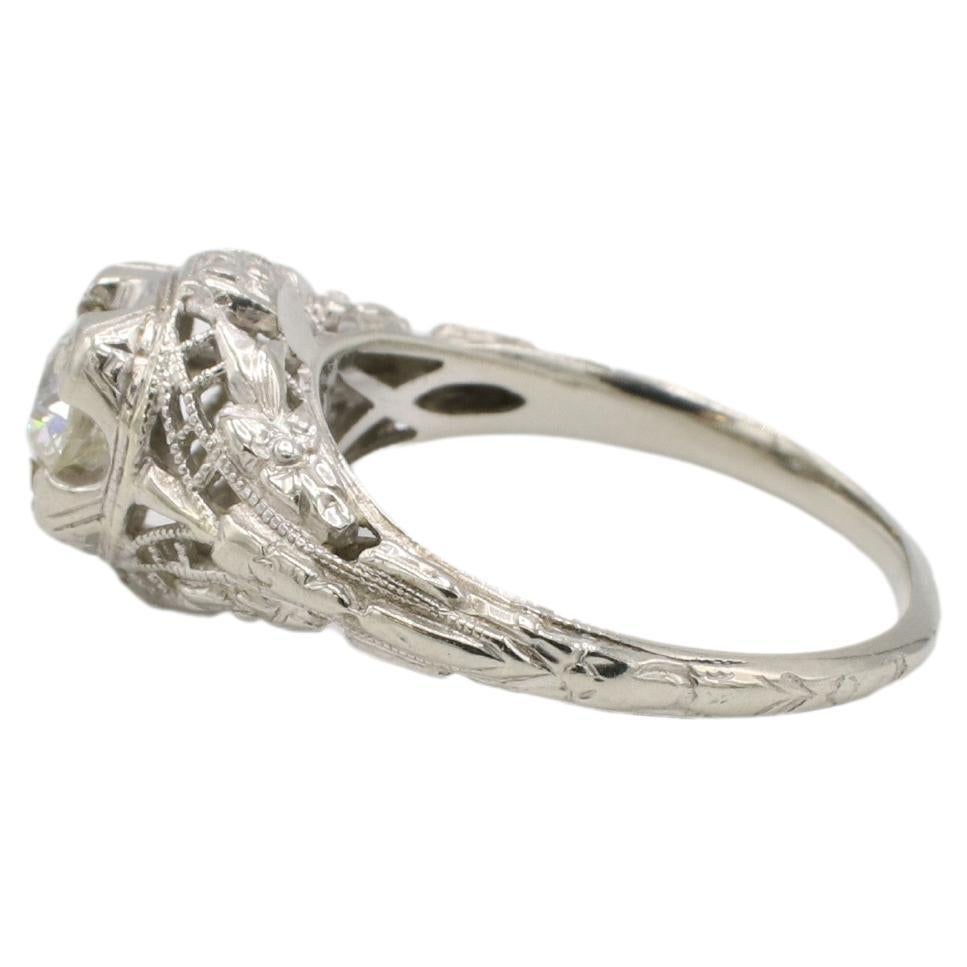 Art Deco 18 Karat White Gold Old European Cut Natural Diamond Engagement Ring 
Metal: 18k white gold
Weight: 2.8 grams
Diamond: Approx. 0.55 Carat J VS old European cut natural diamond
Height: 7.5mm
Size: 5.5 (US)
