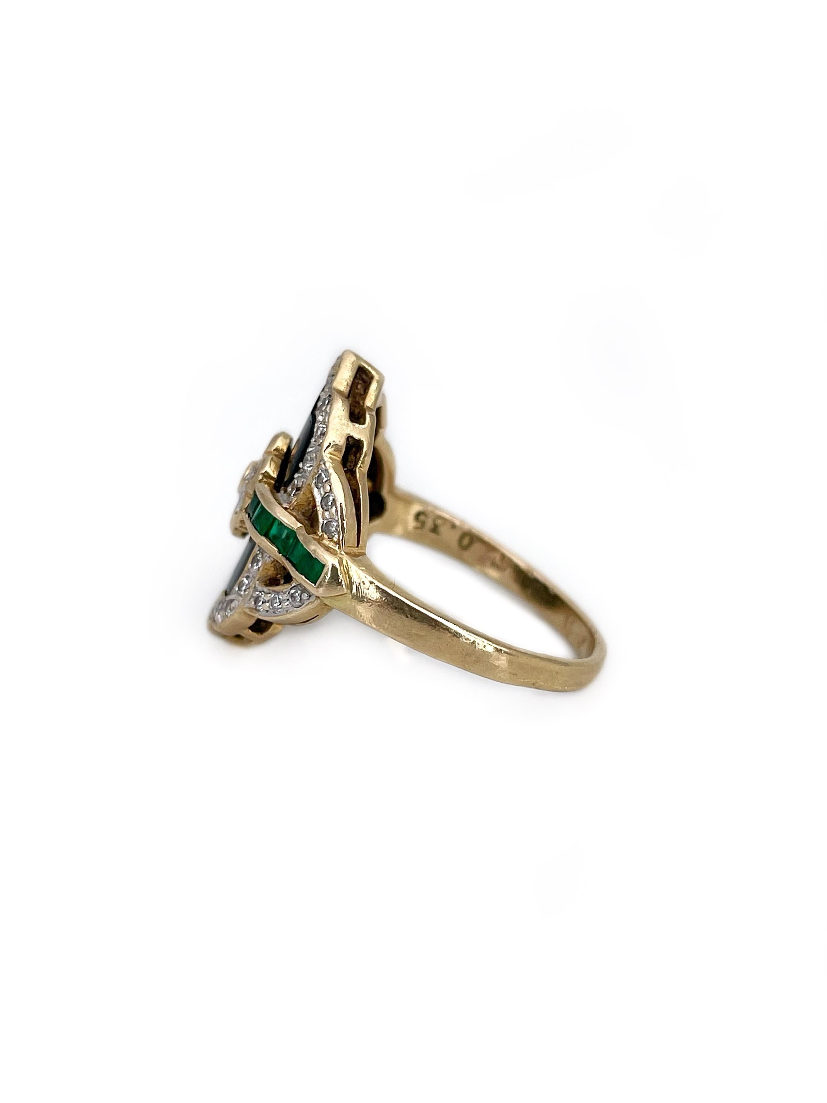 This is a gorgeous design shield ring crafted in 18K yellow gold. The piece features:

- onyx
- 41 pcs. brilliant cut diamonds: TW 0.27ct, RW-W, VS-SI
- 10 pcs. square step cut emeralds: TW 0.14ct, vslbG 6/4, P2

Weight: 4.55g
Size: 16.75