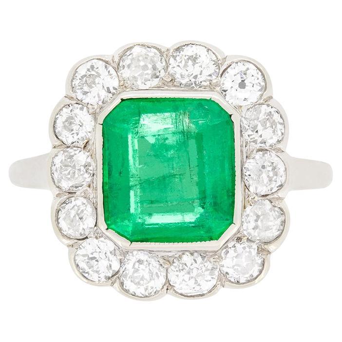 Art Deco 1.80ct Emerald and Diamond Halo Cluster Ring, c.1920s For Sale