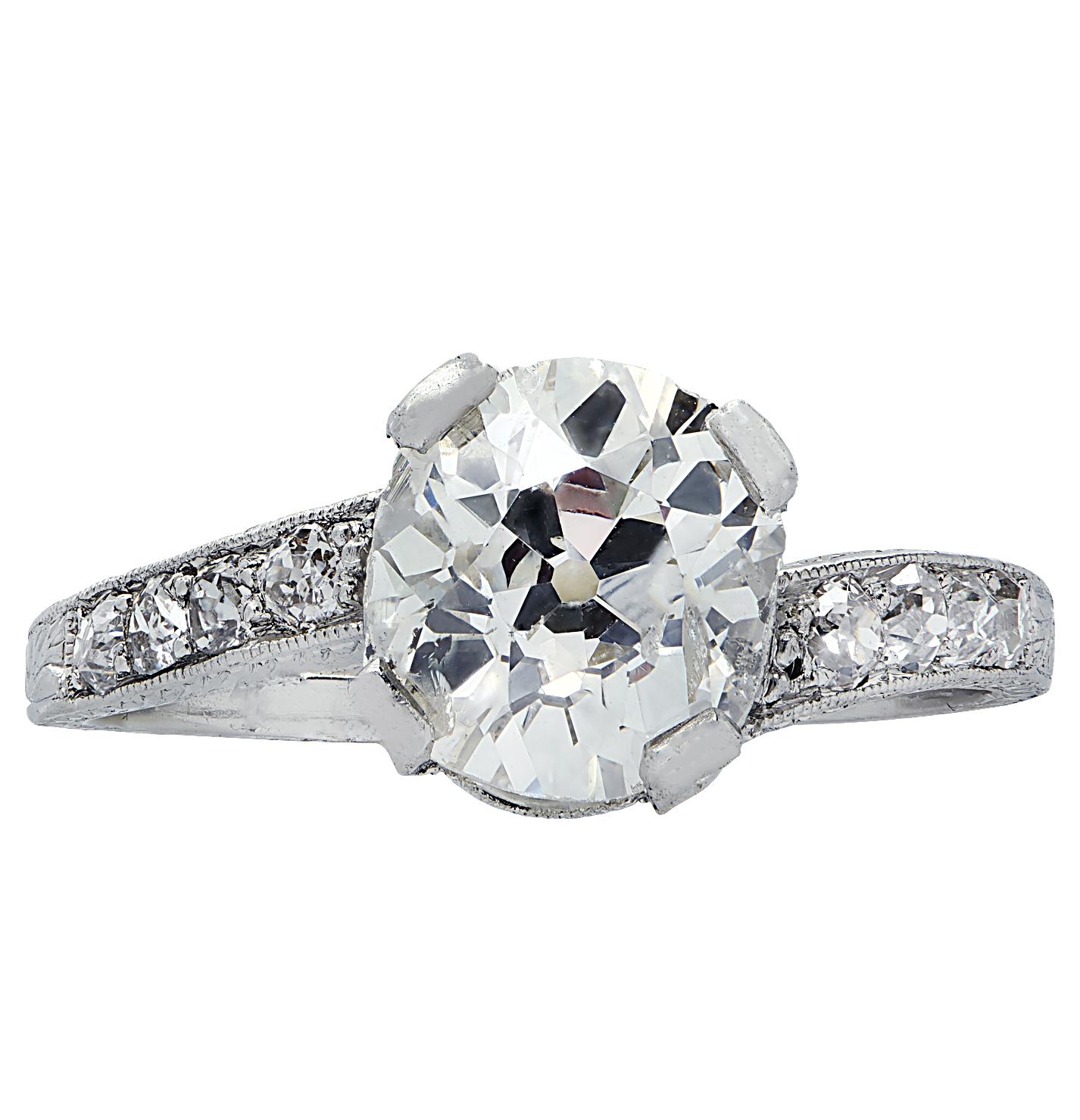 Stunning Art Deco Ring crafted in platinum, showcasing a spectacular old miner cushion cut diamond weighing 1.81 carats, H-I color, and SI clarity. This sensational ring measures 8.17 mm in length, 7.2 mm in width, weighs 3.6 grams and is a size