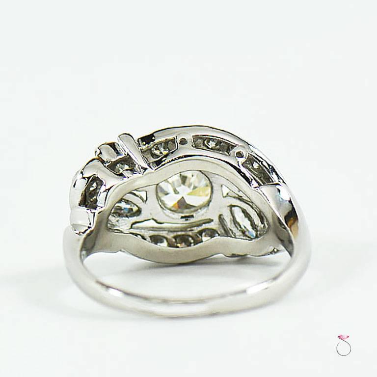 Art Deco 1.88 Carat I, VS1 Diamond Cluster Halo Platinum Engagement Ring For Sale 1